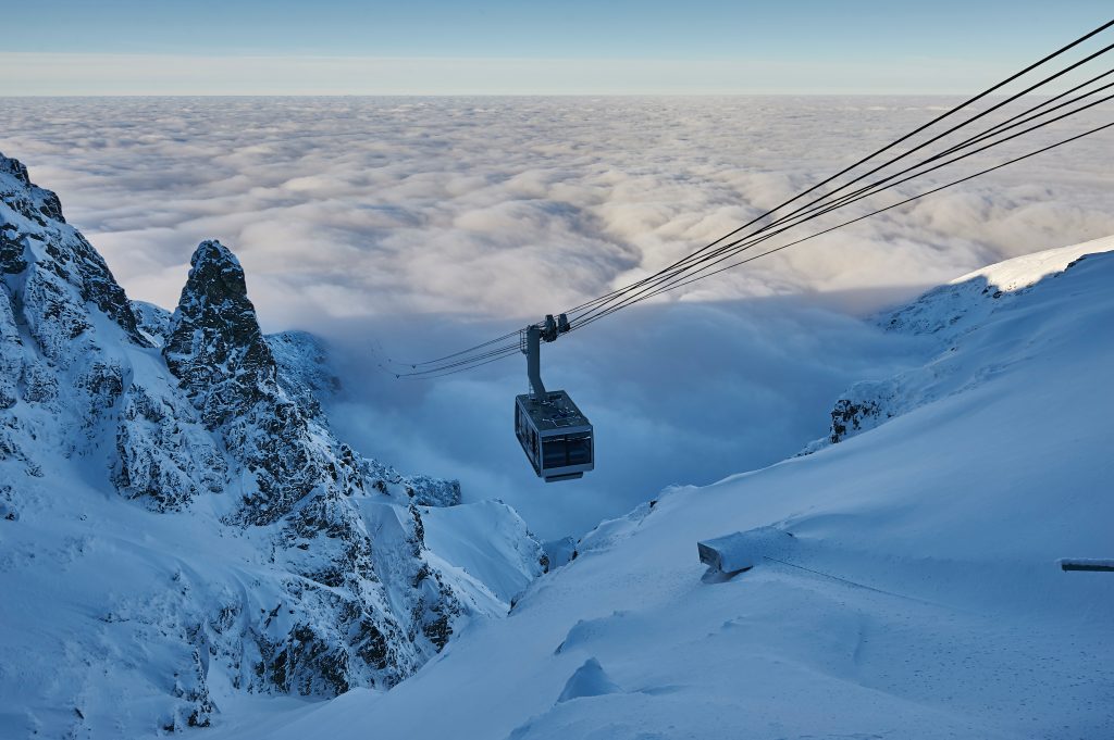 Chair lift on Kasprowy Wierch with Gasienicowa valley in the distance, nature